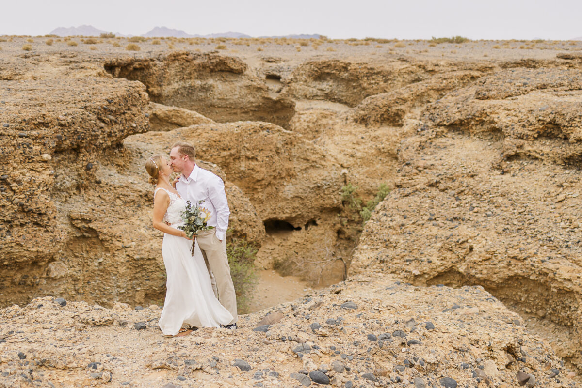 Couple during wedding photos in Sesriem Canyon, Namibia, image by Mariette du Toit Photography