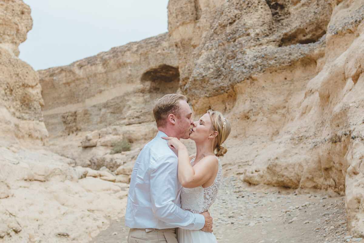 Couple during wedding photos in Sesriem Canyon, Namibia, image by Mariette du Toit Photography