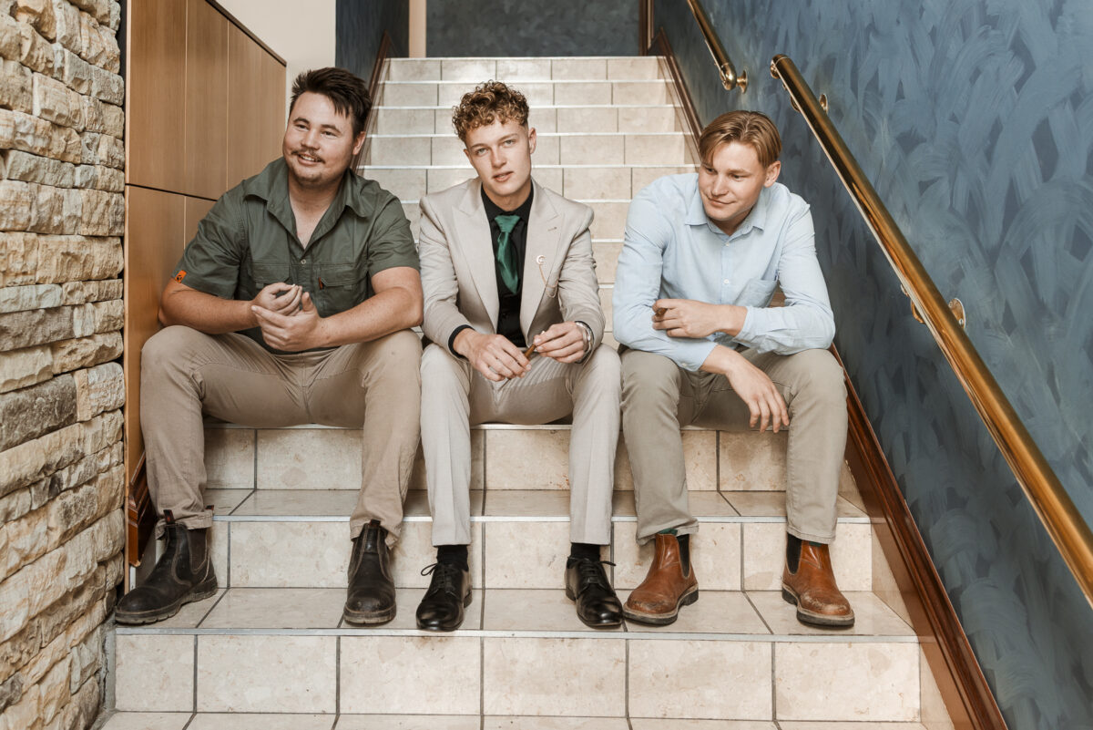 image of 3 lads on steps in hotel during matric farewell photo shoot, walvis bay, namibia, mariette du toit photography