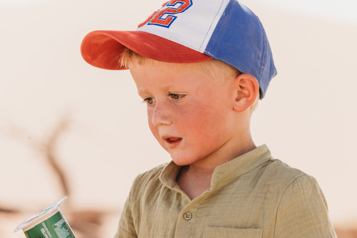 family-photo-shoot-in-sossusvlei-namibia, image of boy by mariette du toit photography