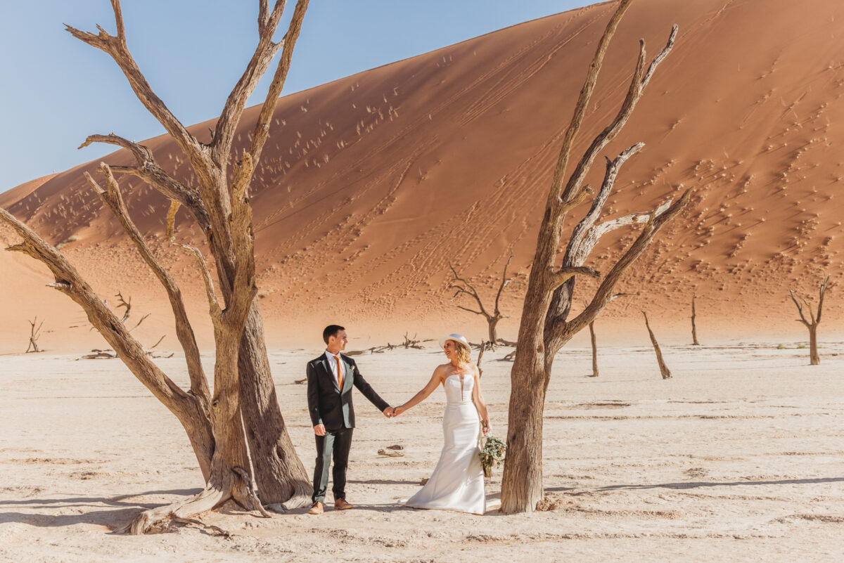 summer elopement in deadvlei namibia with a bridal room wedding dress