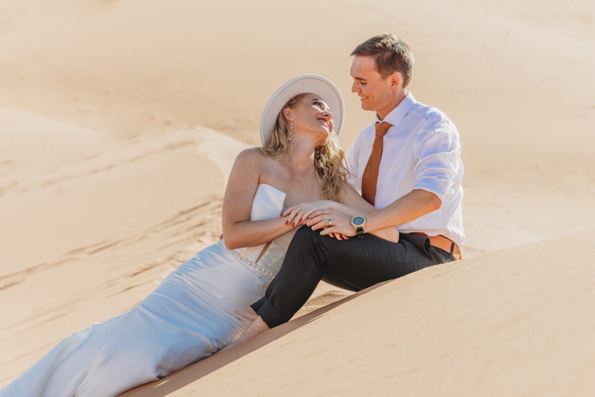summer elopement in sossusvlei namibia with a bridal room wedding dress