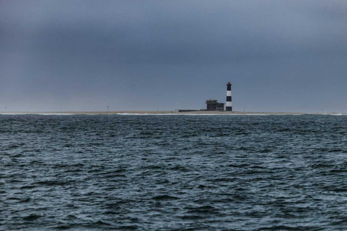 Pelican Point lighthouse, Namibia. Image by Mariette du Toit Photography