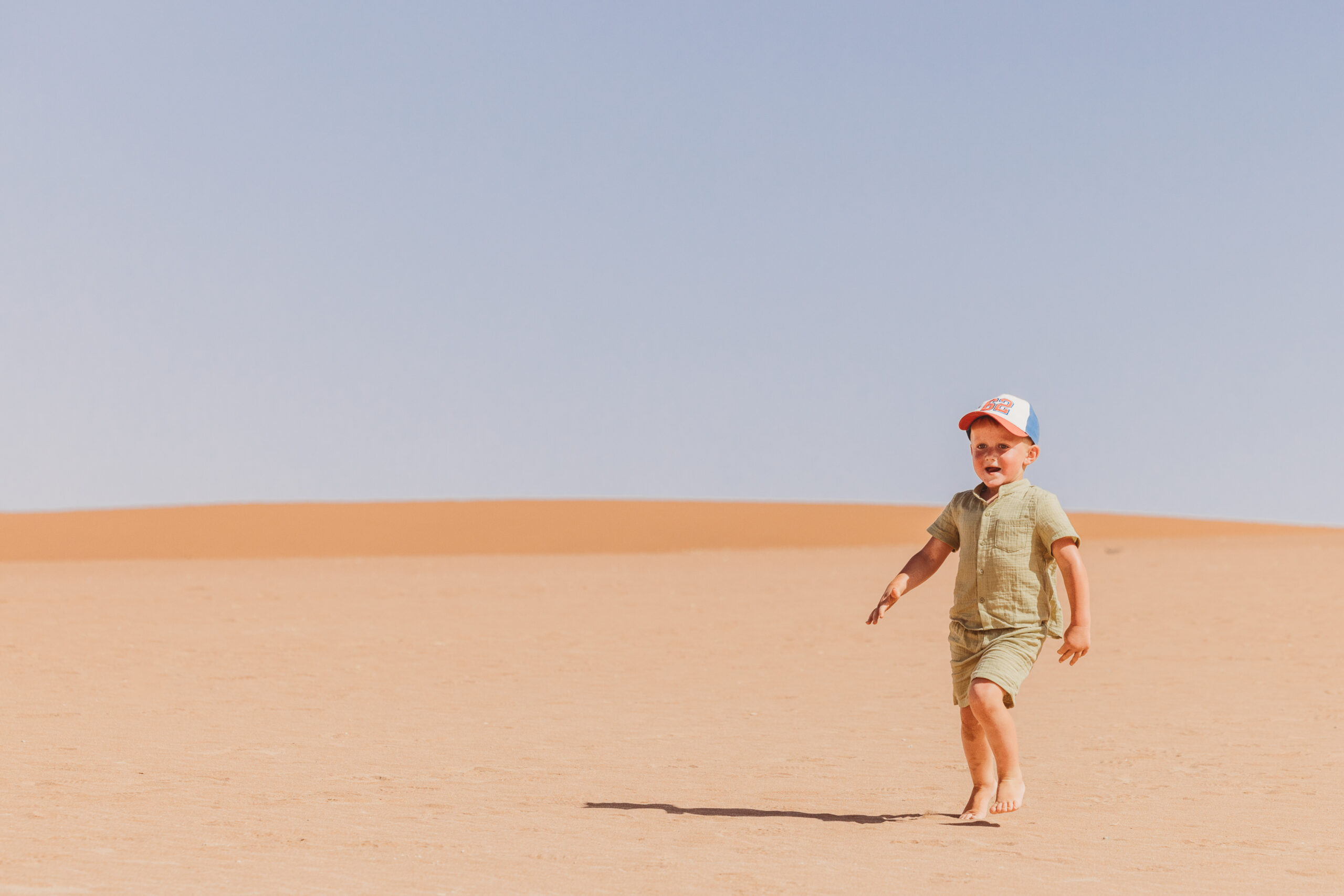 child in deadvlei during midday