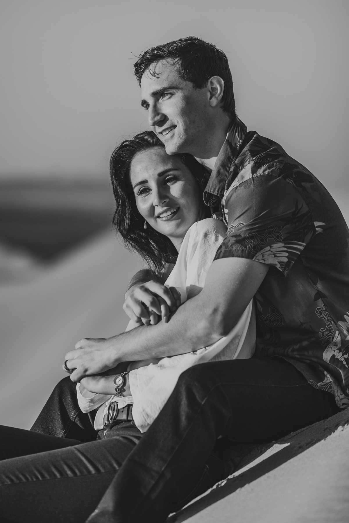 couple hugging on dunes swakopmund