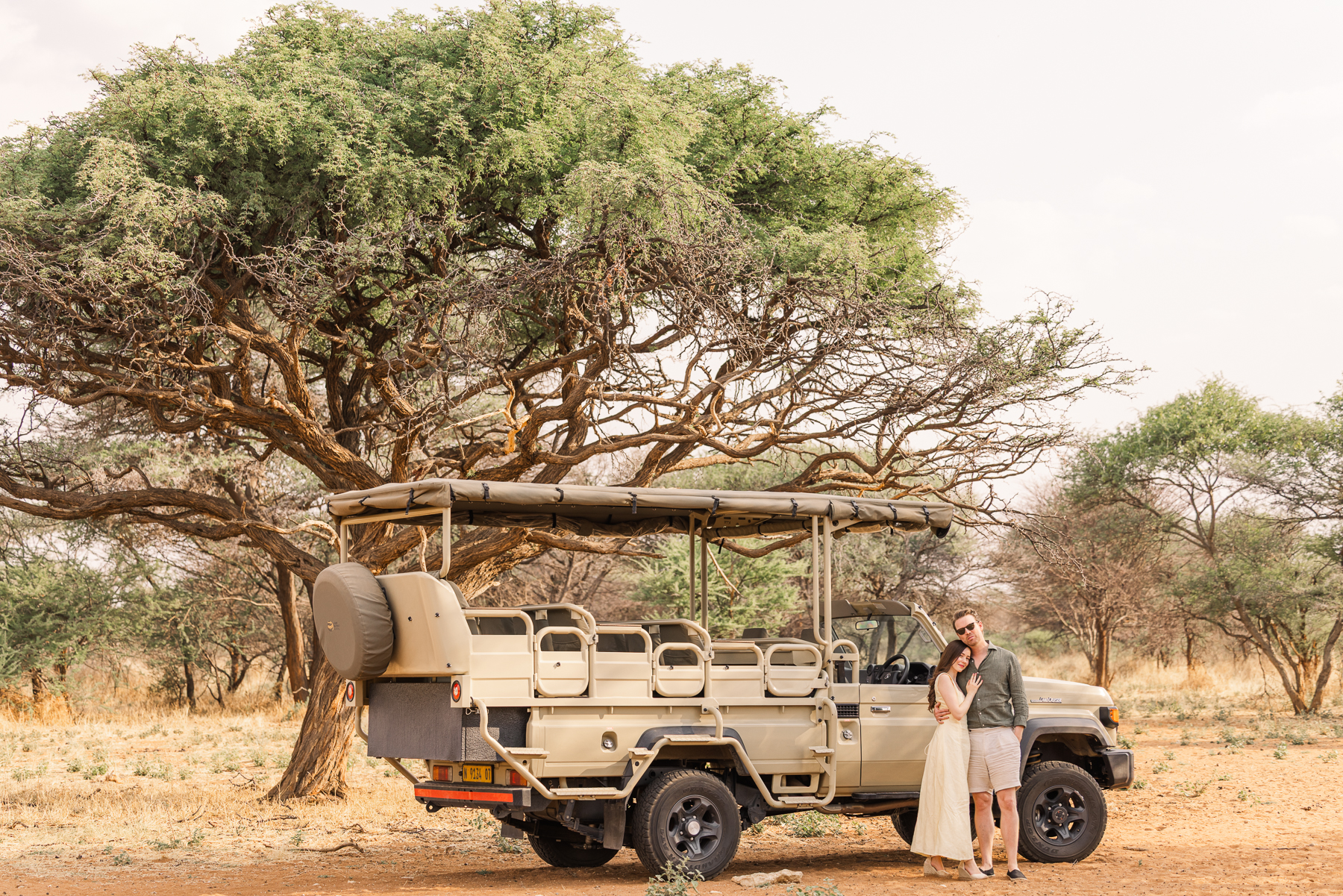 couple in african savannah at sunset