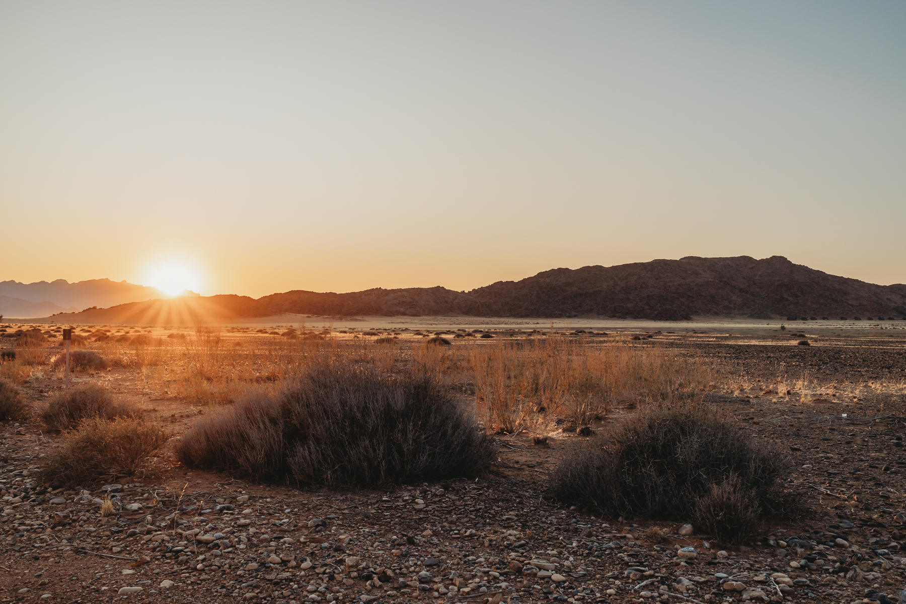 sun rising over naukluft mountains, namibia